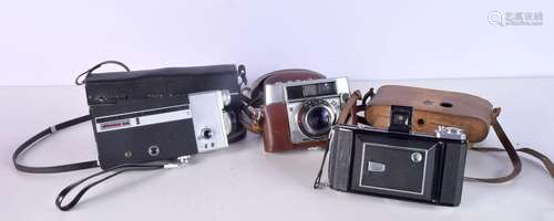 A Zeiss Ikon camera together with a Agfa Optima camera and a...