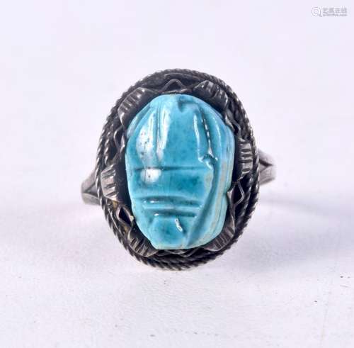 A small silver turquoise stone scarub ring (size N ).