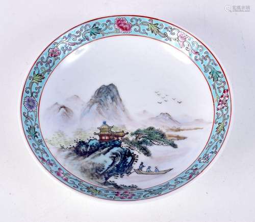 A small Chinese porcelain dish decorated with a mountainous ...