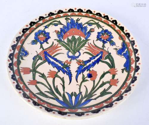 A glazed Middle Eastern Faience dish 31 cm.