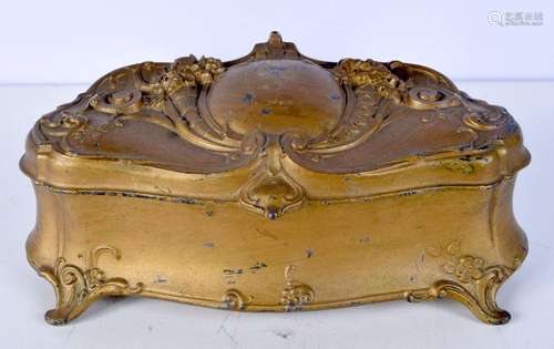 A heavy gilt metal jewellery box 11 x 27 cm.