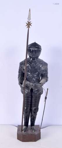 A metal model of a knight in suit of armour 53 cm.