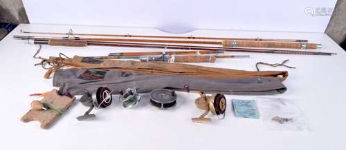 A collection of antique fishing rods, Hardy Perfection , Sea...