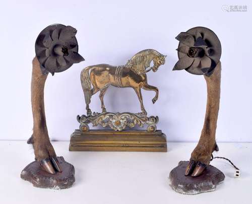 A pair of deer`s foot wall sconces together with a brass fir...