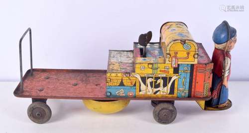 A vintage tin plate wind up luggage truck 30 cm.