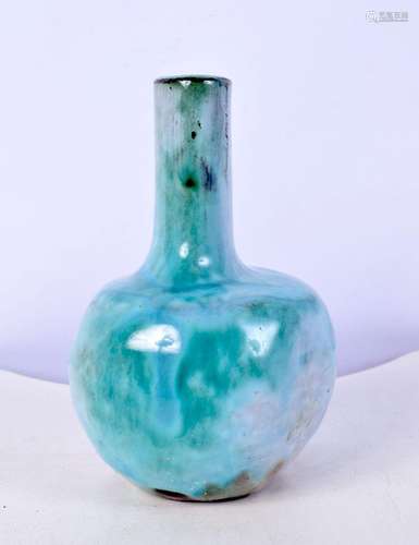 A small continental pottery glazed vase 11 cm.