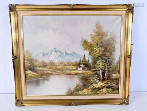 A Framed oil on canvas of a mountainous riverside 49 x 59 cm...