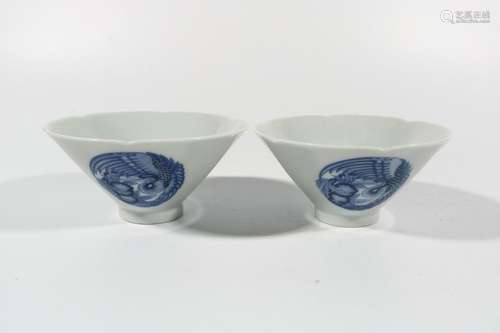 A pair of blue and white phoenix cups