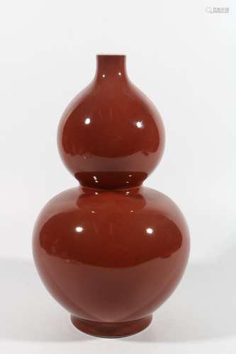 Red-glazed gourd bottle