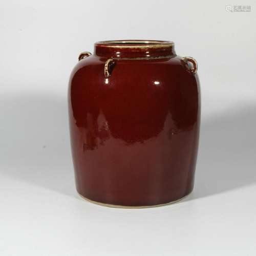 Red-glazed four-series jar