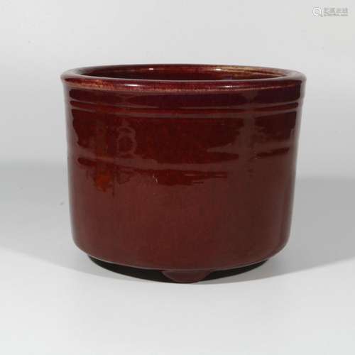 Three-legged incense burner with red glaze