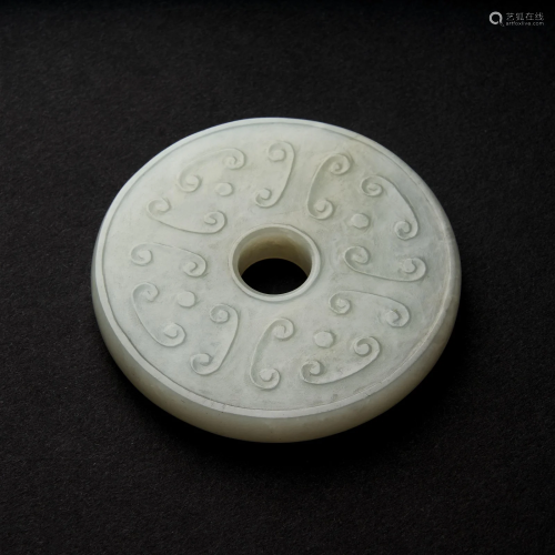 A White Jade Archaistic Bi Disc, Qing Dynasty, 19th Century
