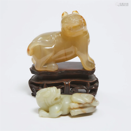 An Agate Carving of a Tiger, Together With a White and Russ