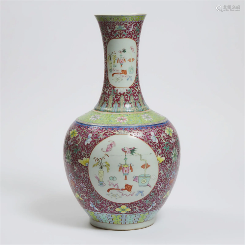 A Large Ruby-Ground Famille Rose Bottle Vase, Qianlong Mark
