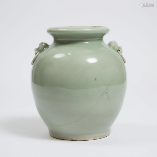 A Pale Celadon Glazed Vase with Moulded Mask Ring Handles,