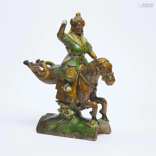 A Chinese Glazed Pottery Figure of a Warrior on Horseback,