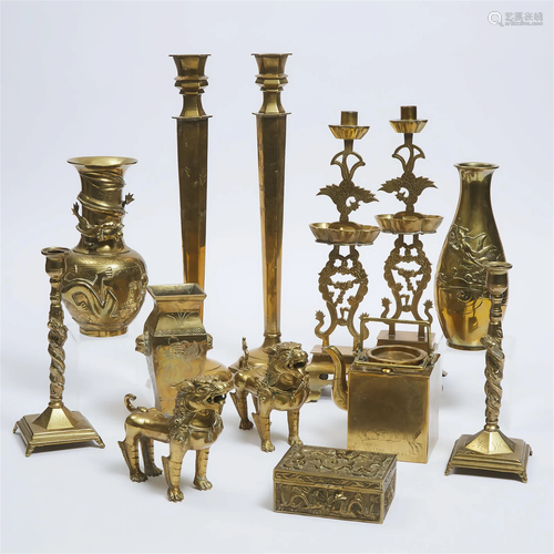 A Group of Thirteen Chinese Brass Candlesticks, Vases, and