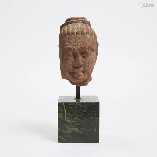 A Kushan/Mathura Red Sandstone Head of Buddha, Circa 2nd Ce