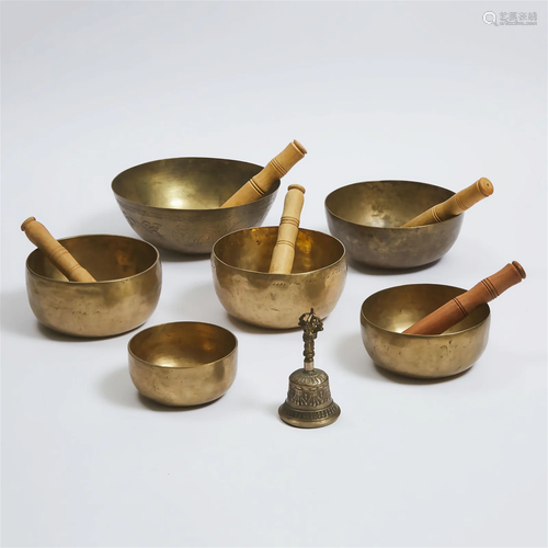 A Group of Six Tibetan Singing Bowls, Together With a Bell,