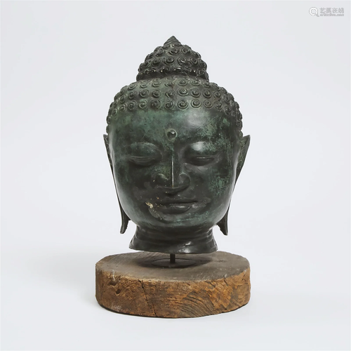 A Thai Bronze Head of Buddha, 19th/20th Century, with stand