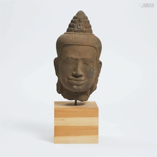 A Khmer Stone Head of Avalokiteshvara, Cambodia, 14th Centu