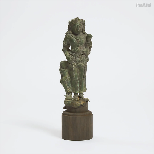 A Bronze Figure of a Mother Goddess, Java, 14th Century, in