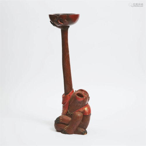 A Large Japanese Red Lacquered Wood Candlestick in the Form