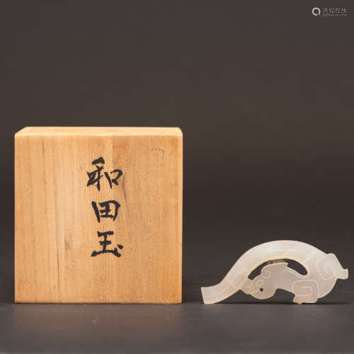 A CARVED WHITE JAED PLAQUE WITH JAPANESE BOX