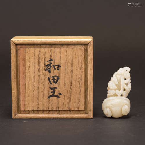 A WHITE JADE CARVING WITH JAPANESE BOX