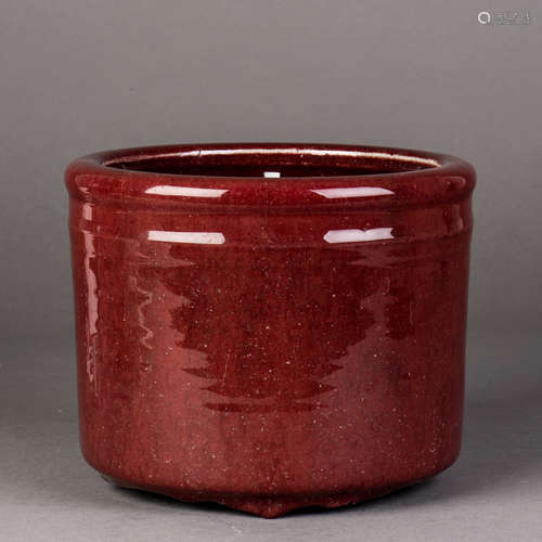 A CHINESE COPPER RED GLAZED BRUSH POT