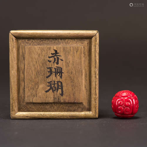 A CORAL BEAD WITH JAPANESE BOX