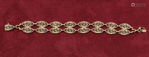 Bracelet  En or jaune 18 K (750 ‰) filigrané <br />
Poids ne...