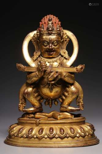 Gilt bronze statue of the Lord with golden staff