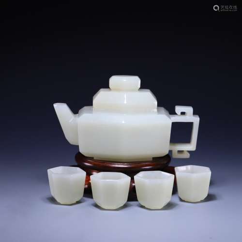 A set of Hetian jade pot and four cups,