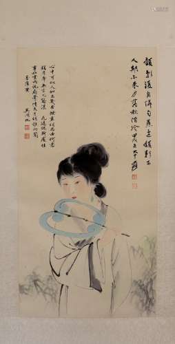 Lady Zhang Daqian holding a fan