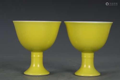 Pair of yellow glazed goblet