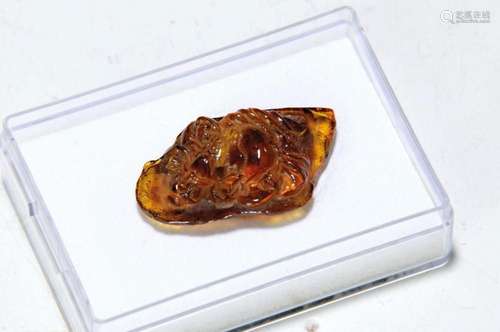 Carved amber from Mexico with a Buddha, about 35 million