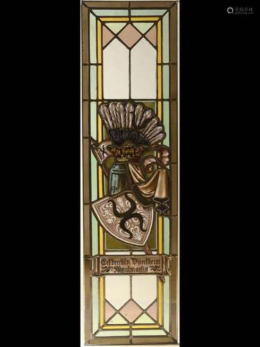 Two large stained glass windows with the coat of arms of