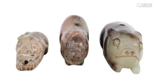 Three Chinese Jade and Hardstone Pigs