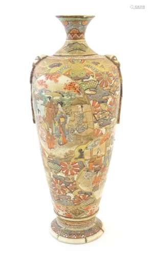 A Japanese satsuma vase with relief twin handles and panelle...