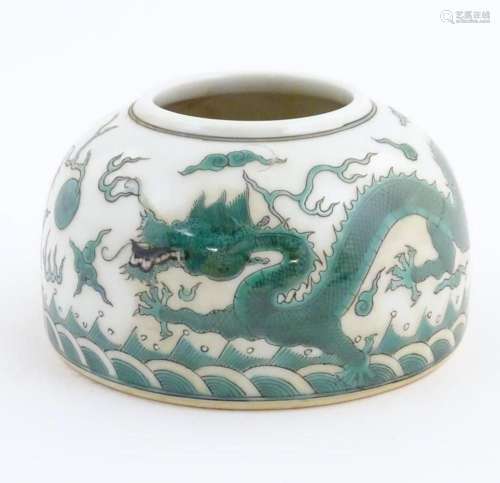 A Chinese brush wash pot of dome form decorated with dragons...
