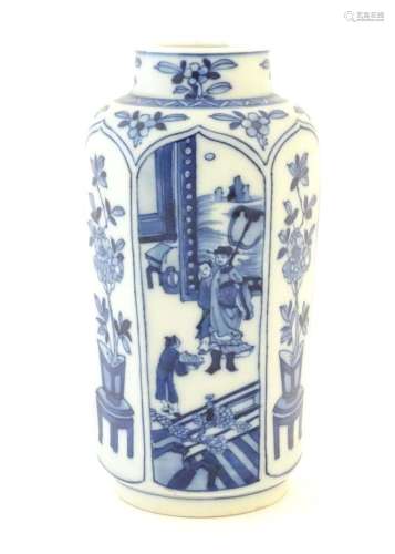 A Chinese blue and white vase with panelled decoration depic...