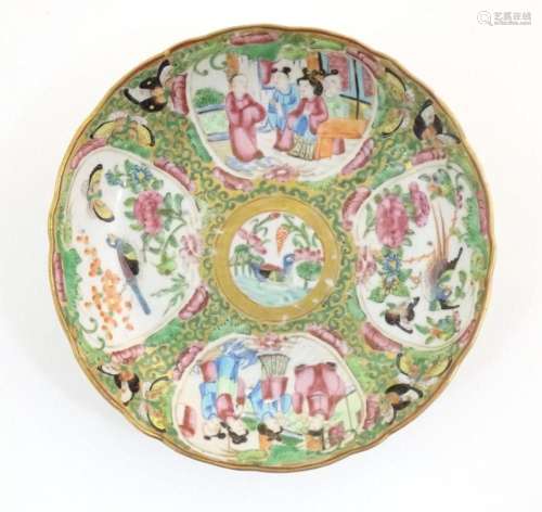 A Chinese / Cantonese plate decorated with figures, birds, b...