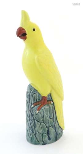 A Chinese model of a yellow cockatiel style bird. Impressed ...