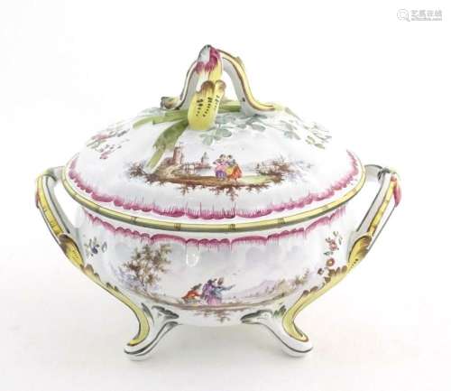 A French lidded tureen with foliate formed handles and stand...