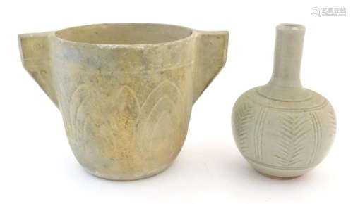 Two items of studio pottery comprising a bottle vase with in...