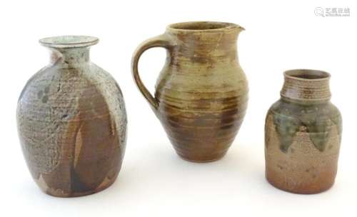 Three studio pottery items to include a vase by Liz Teall, i...
