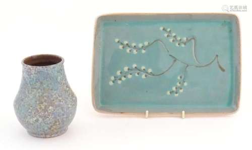 A Poole Pottery vase with a mottled blue glaze, marked under...