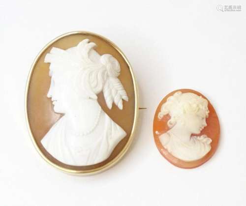 A shell carved cameo brooch within a yellow metal mount, tog...