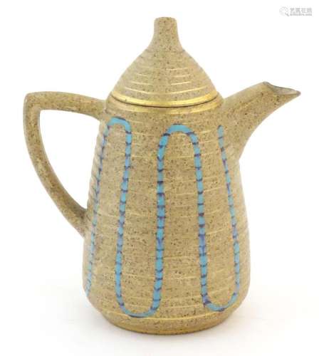 A Clarice Cliff coffee pot in the Goldstone pattern, with bl...